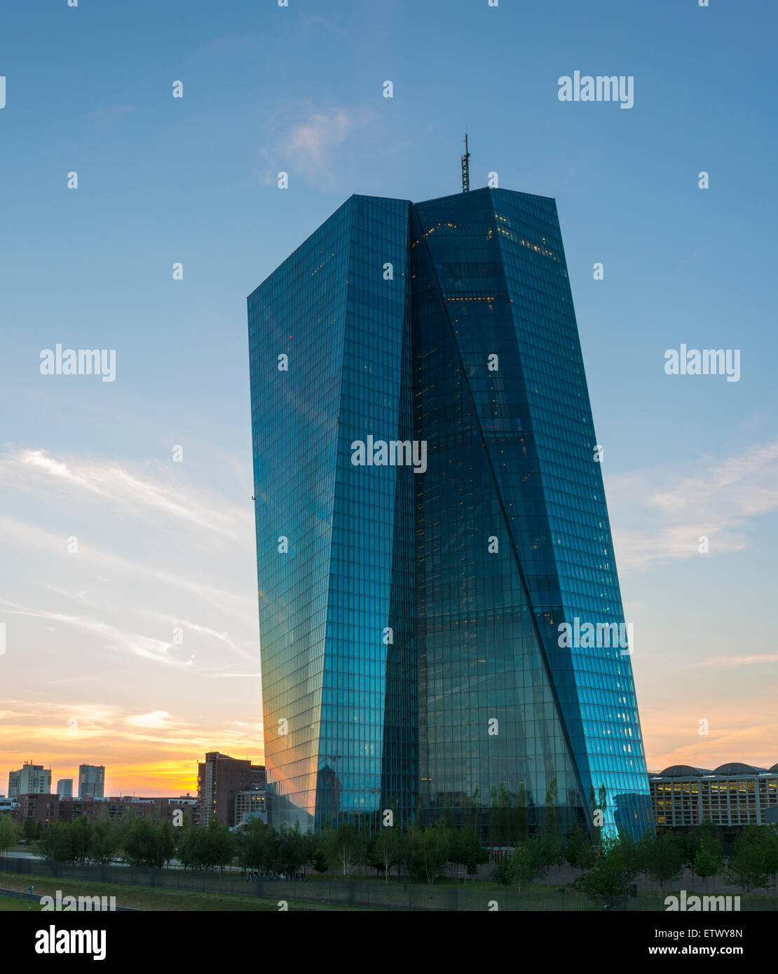 The new European Central Bank, ECB, against the skyline of Frankfurt at sunset, Frankfurt, Hesse, Germany Stock Photo