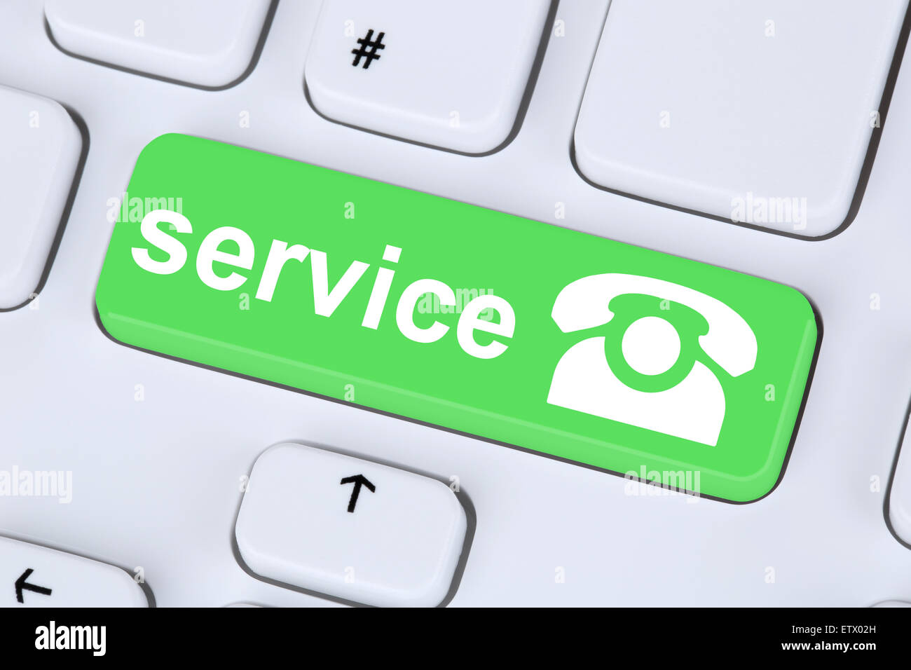 Calling service customer hotline telephone symbol on computer keyboard Stock Photo