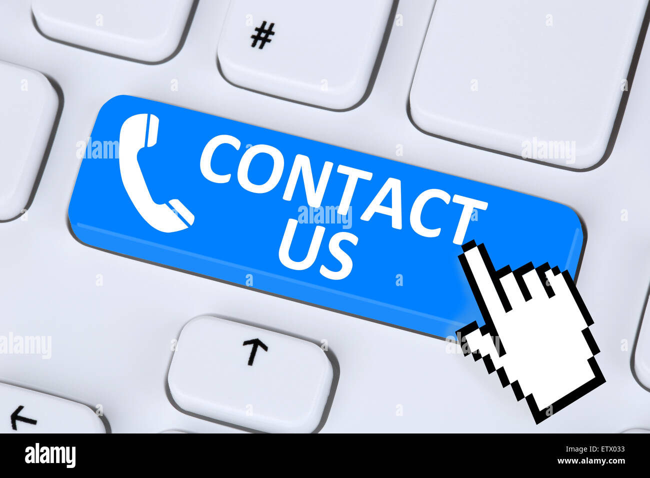 Contact us calling service customer hotline telephone symbol on computer keyboard Stock Photo