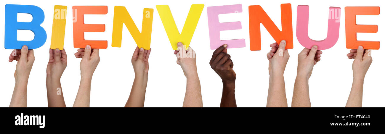 Many Hands Holding the Colorful Spanish Word Bienvenido, Which Means  Welcome, Isolated Stock Photo - Alamy