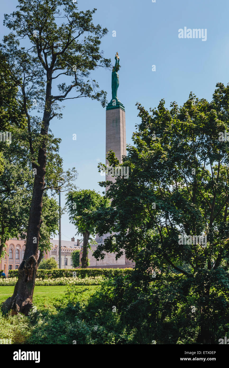 Latvian Freedom Monument (Brivibas piemineklis) seen from Bastejkalna Parks, Riga, Latvia Stock Photo