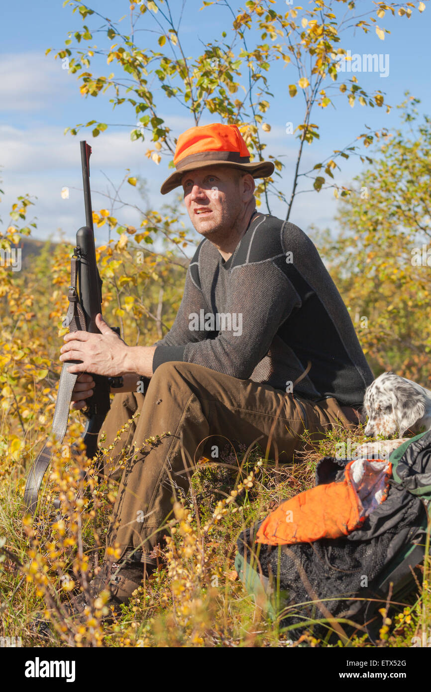 White man, 45-50 years old hunting in autumn season in Jukkasjärvi, Kiruna, Swedish lapland, Sweden Stock Photo