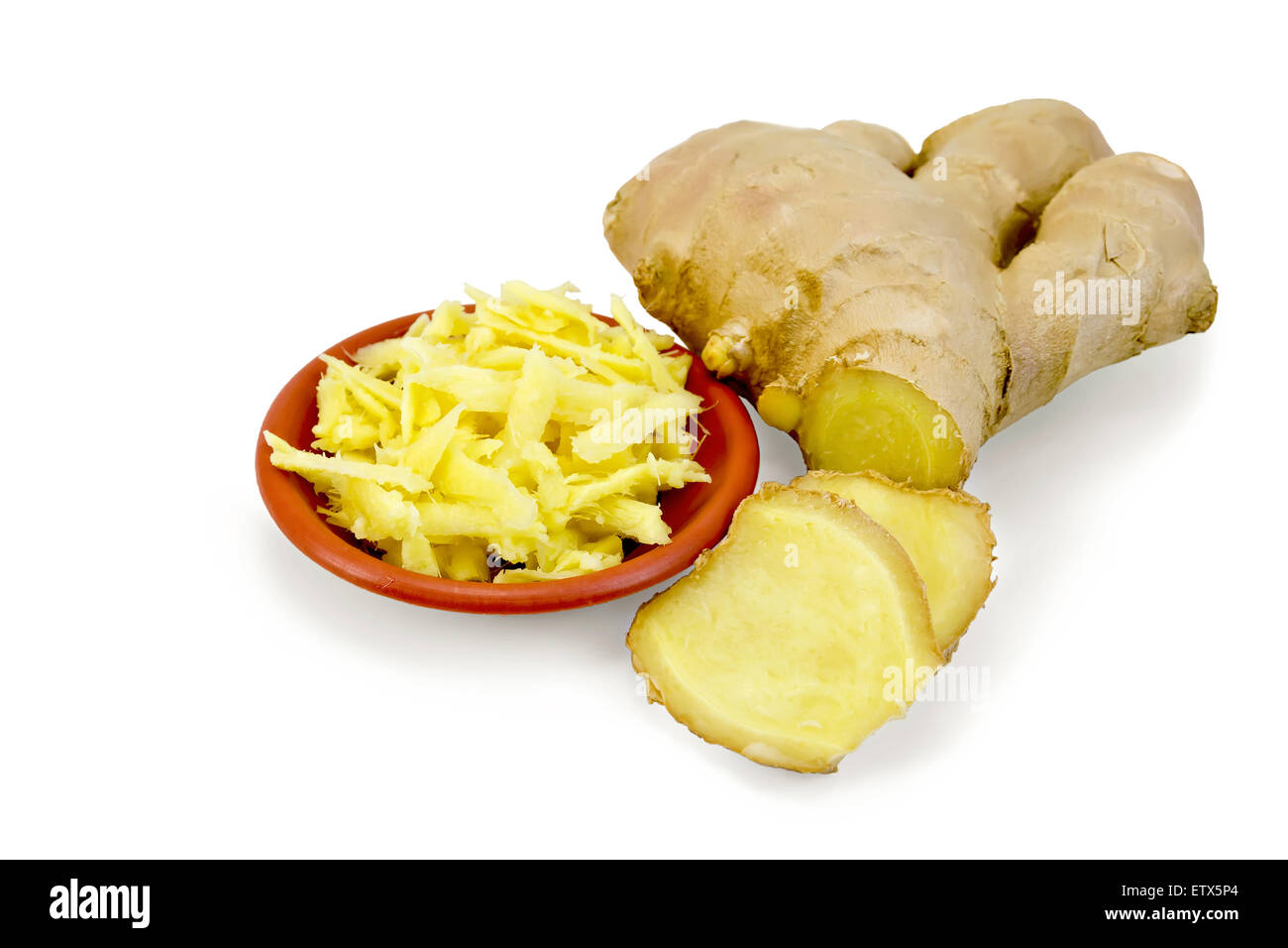 Ginger grated in bowl with root Stock Photo Alamy
