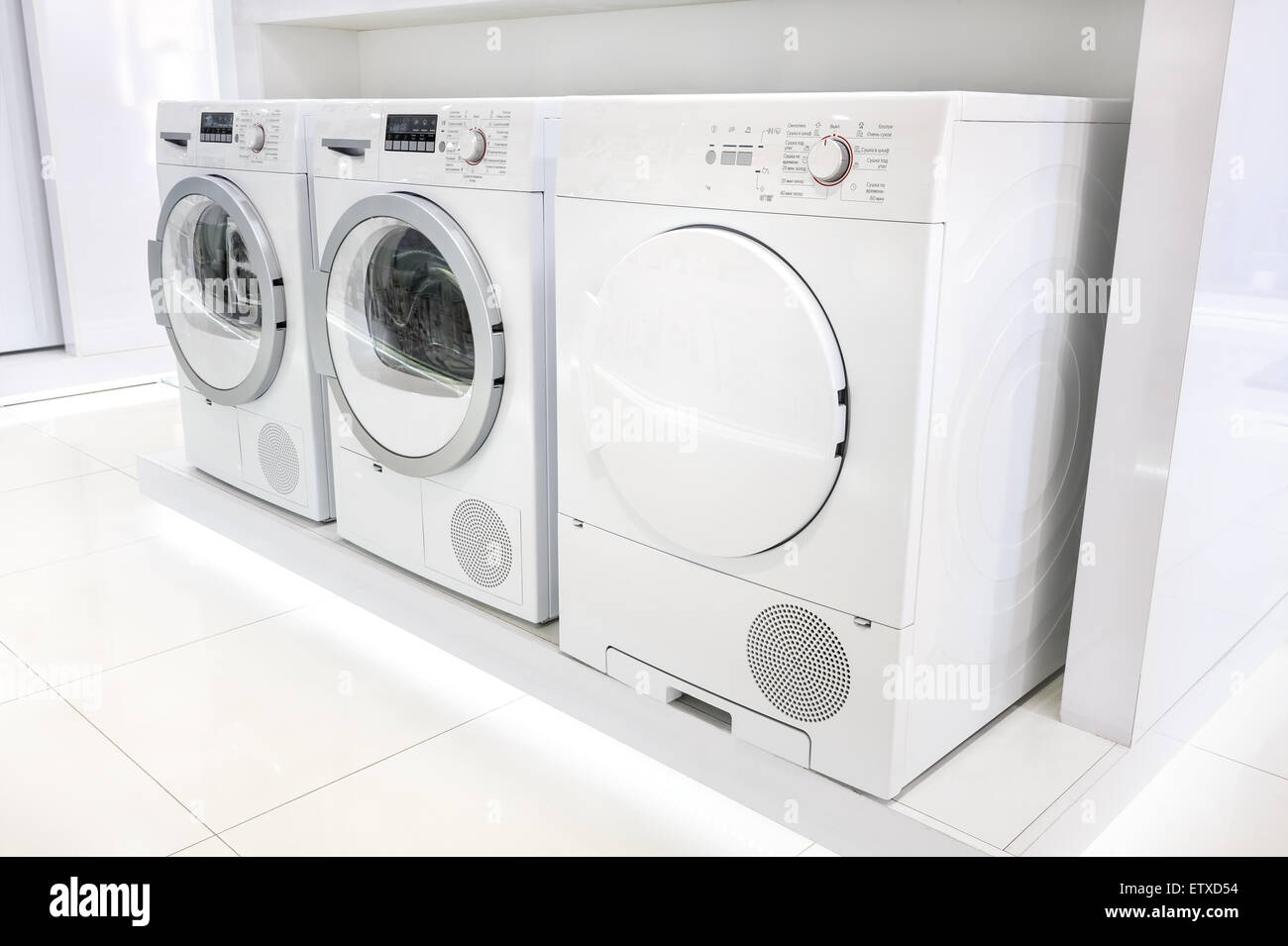 Row of washing machines hires stock photography and images Alamy