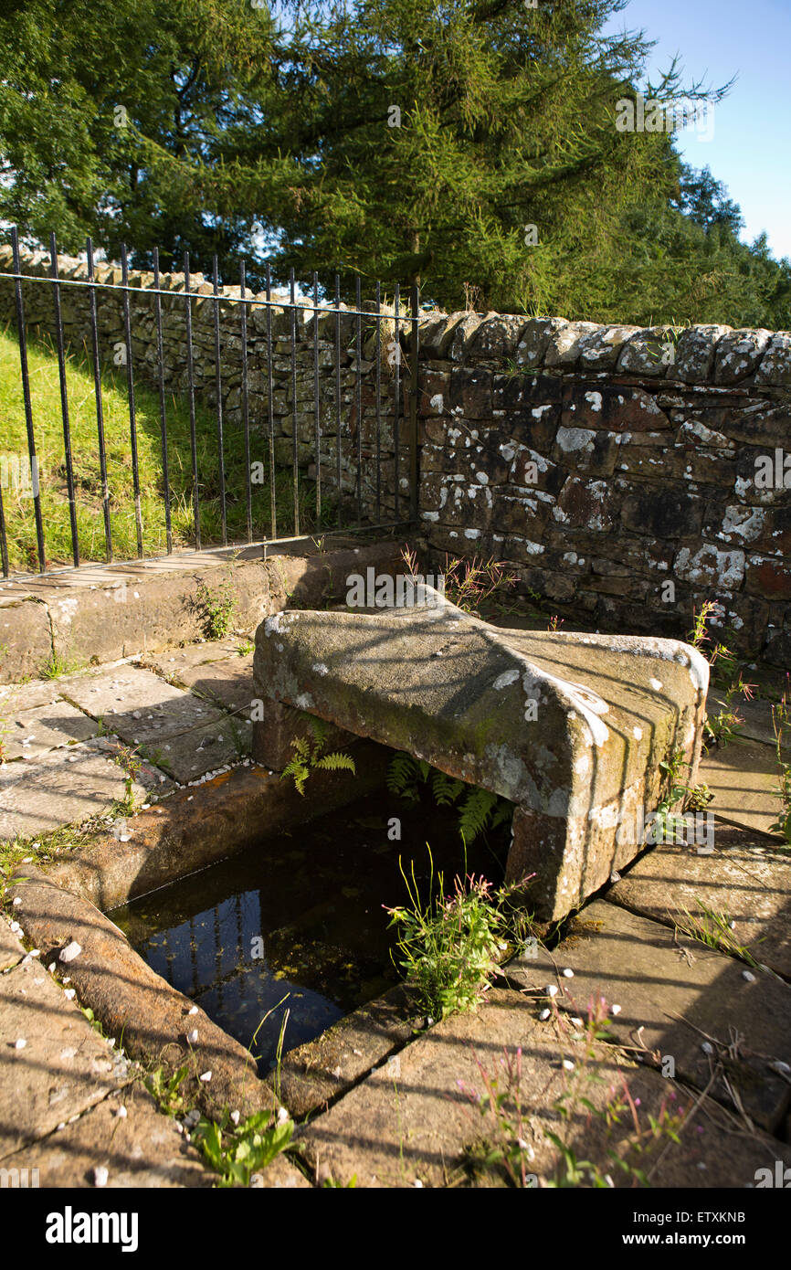 UK, England, Derbyshire, Eyam, Mompesson’s Well, old packhorse drinking trough used in plague period Stock Photo