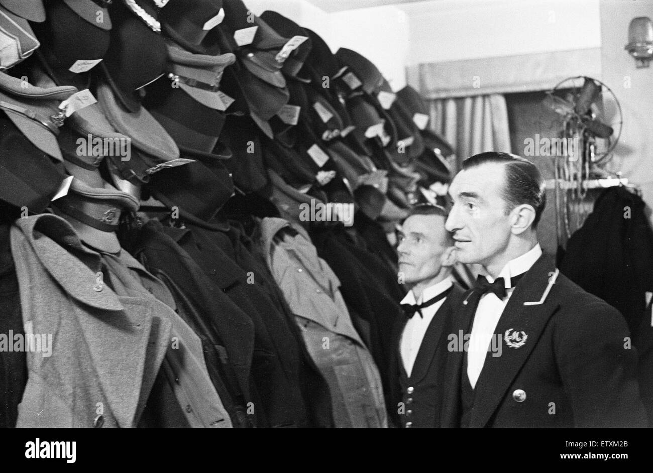 Cloakroom attendants at the Mirabelle Restuarant. Circa 1946 Stock