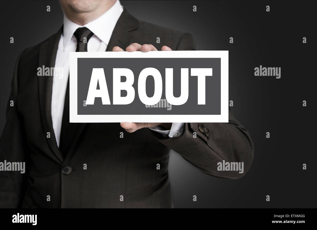 About sign held by businessman. Stock Photo
