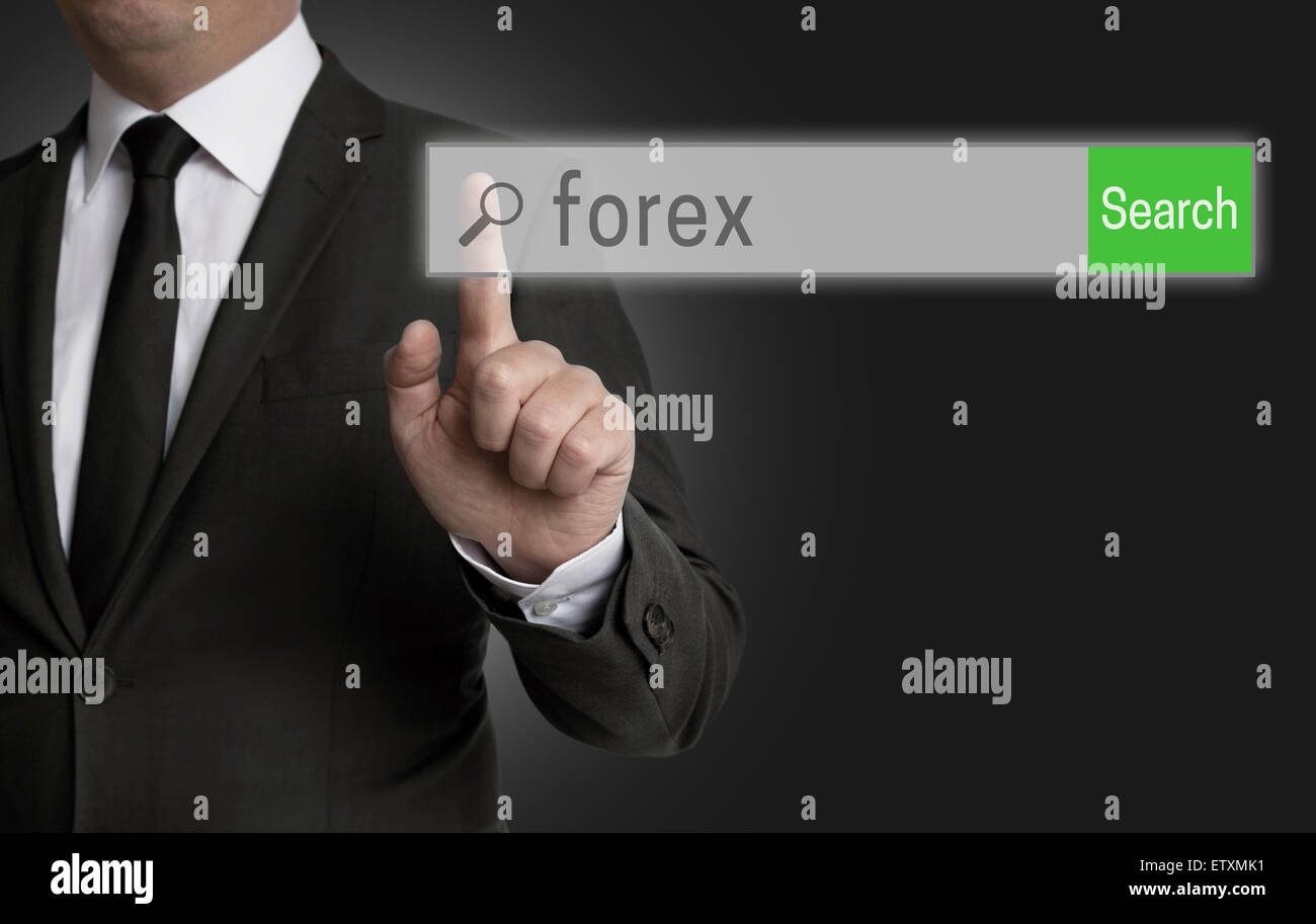 Forex internet browser is operated by businessman. Stock Photo