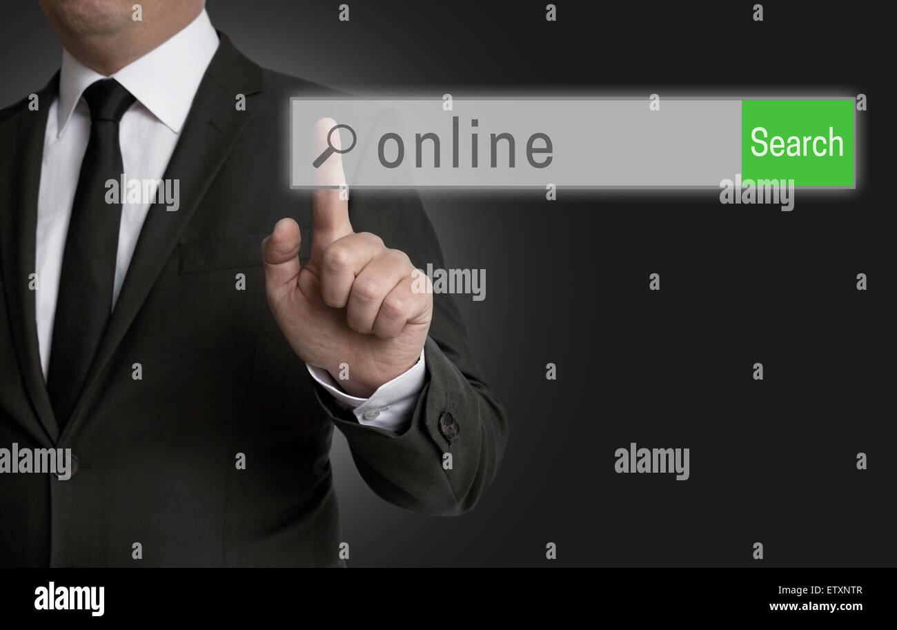 Online internet browser is operated by businessman. Stock Photo