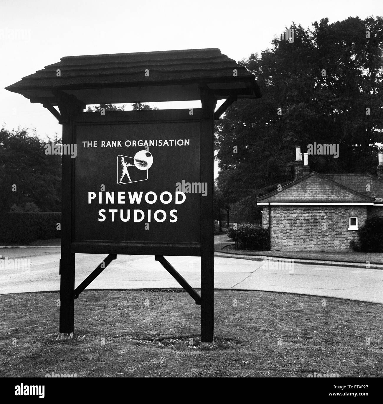 Exterior view showing the sign at Pinewood film studios at Iver Heath, Buckinghamshire, England. 30th September 1957 Stock Photo