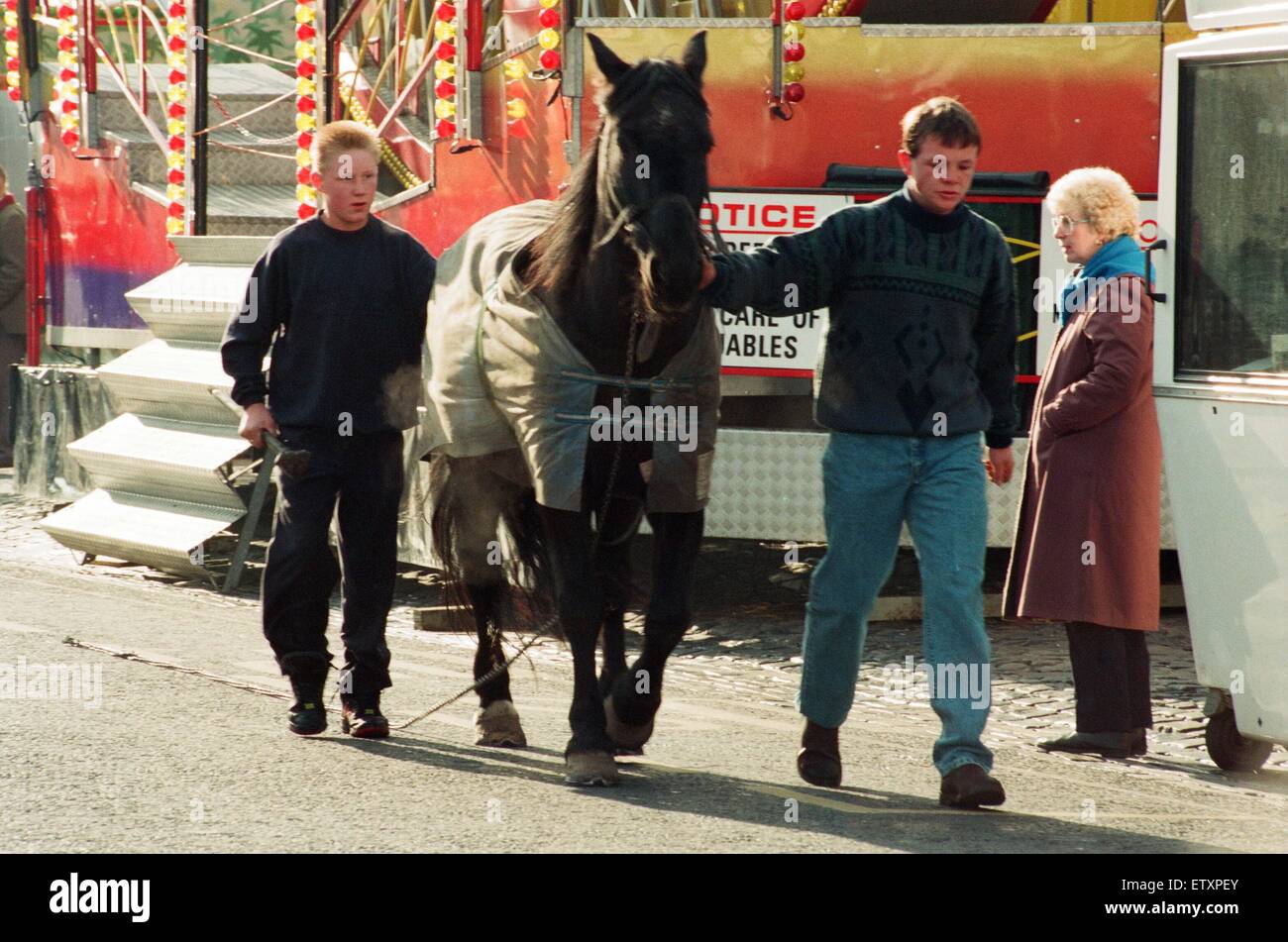 Traveller lads with one of their horses at the annual Riding the Fair procession sets off from Yarm Town Hall. The riding is the occasion when the official proclamation authorising the fair is read out at various points in the town. 23rd October 1993. Stock Photo
