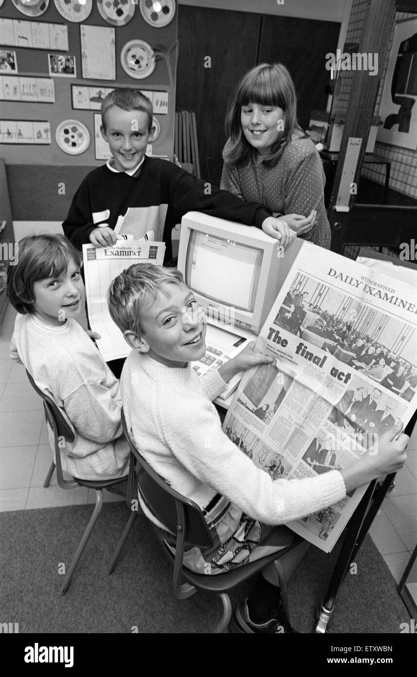 Hold the front page...! With deadline approaching budding newshounds at Meltham County Primary School are hoping to create a paper with a difference. Class 5 wrote to Stop Press asking if the Examiner uses recycled paper at all. Having been shown round th Stock Photo