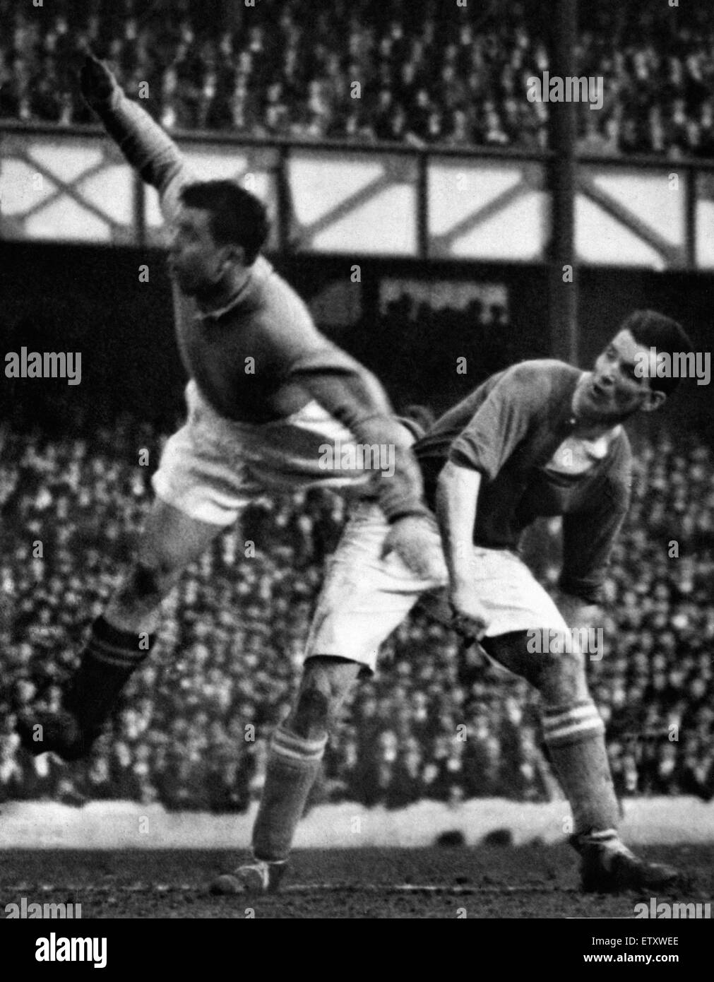 Everton footballer Dixie Dean in action for his team during a league match at Goodison Park. Circa 1935. Stock Photo
