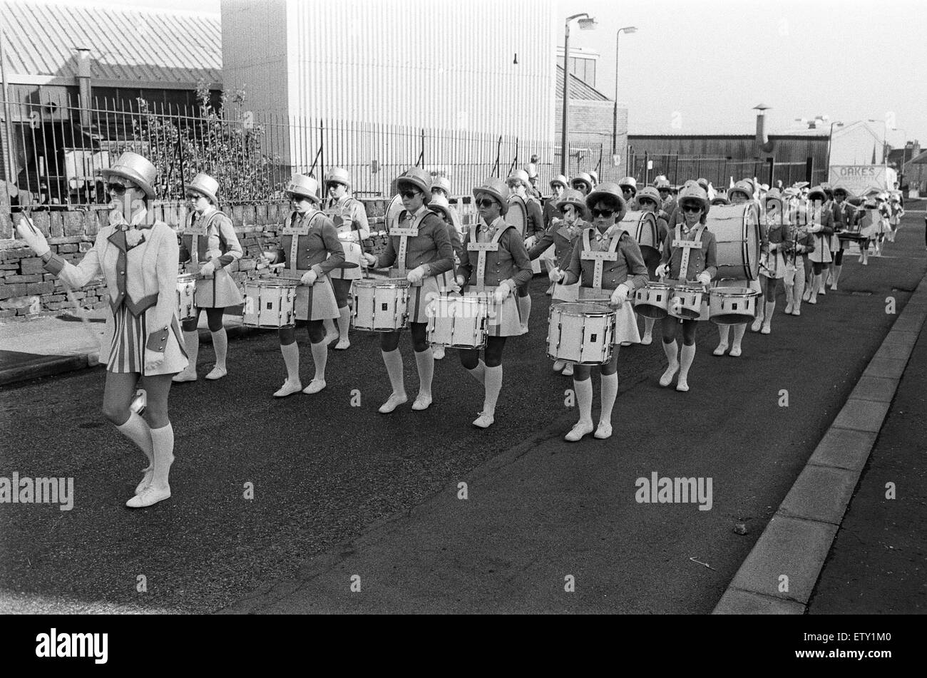 Oakes Majorettes have had a new beginning, in more ways than one. On Saturday they acquired a new name, New Concept, and a new headquarters. Fronted by corps drum major Miss Anne-Marie Rainey, they are pictured marching from their old base at Oakes Youth Stock Photo