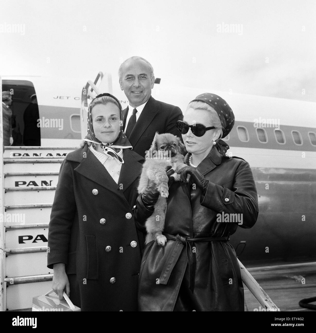 Zsa Zsa Gabor at London Airport with her daughter Francesca Hilton and husband Herbert Hutner, after flying from from Nice, en route to Los Angeles. 7th August 1964. Stock Photo