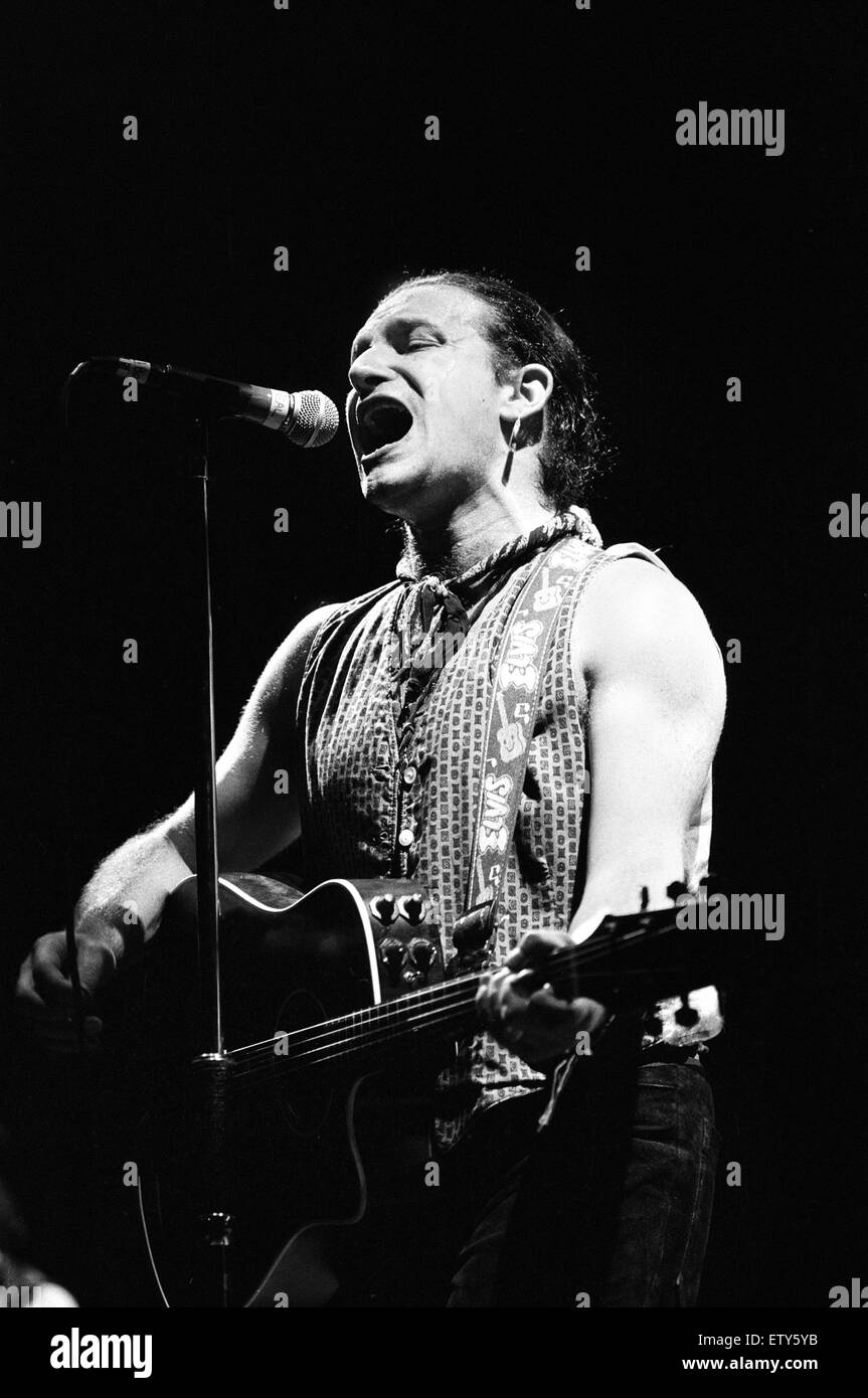 Rock group U2 performing on stage at the National Exhibition Centre in Birmingham. Pictured is lead singer Bono. 3rd June  1987. Stock Photo