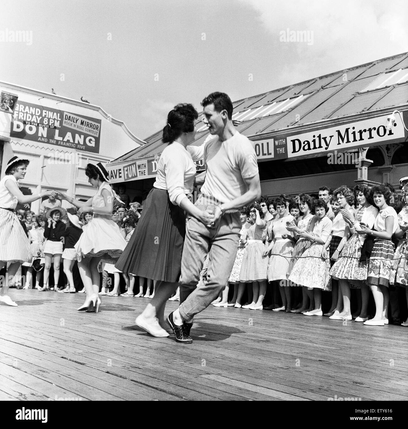 Dancing during a rock and roll session on the central pier in Blackpool, Lancashire. 4th August 1960. Stock Photo