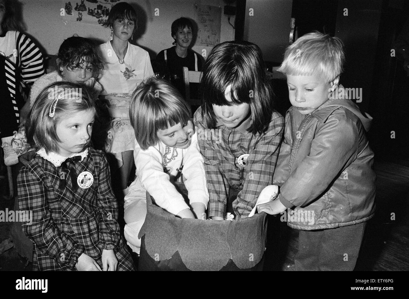 All hands into the lucky dip... trying their luck at a birthday bazaar organised for the 21st anniversary of St James's Playgroup, Marsh, are (from left) Ruth McGuigan, Claire Grundy, Lisa Cotton and Robert Blaker. The event, at St James's Parish Hall, wa Stock Photo