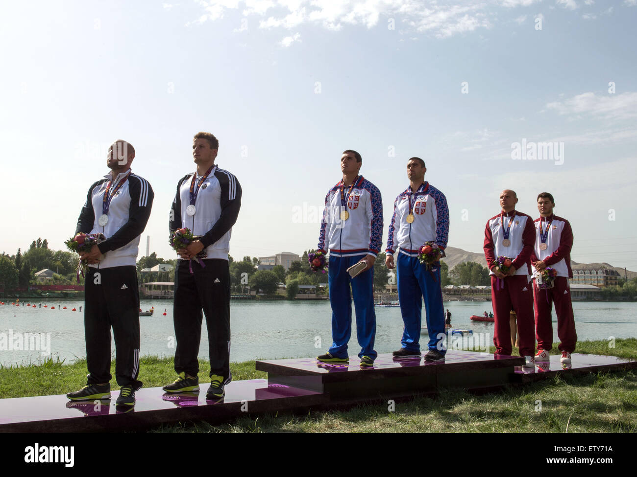 Baku, Azerbaijan. 16th June, 2015. Silver medalists Ronald Rauhe (L) and Tom Liebscher (2-L) of Germany, gold medalists Nebojsa Grujic (3-L) and Marko Novakovic of Serbia (3-R) and bronze medalists Peter Molnar (2-R) and Sandor Totka (R) of Hungary attend Stock Photo