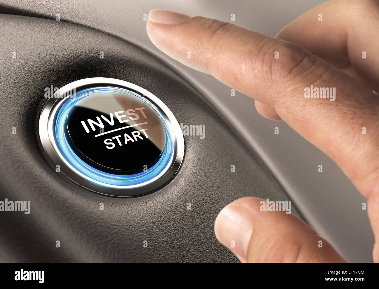 On finger about to press an invest button, financial concept for investment or decision making Stock Photo
