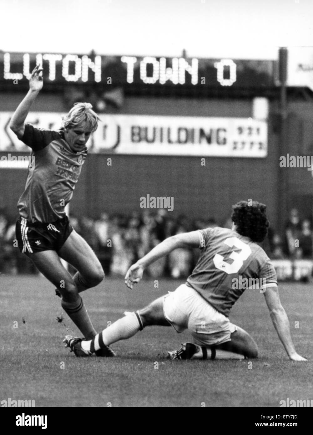 Everton 0 v Luton 1 Town old First Division game at Goodison Park. (Picture shows) Paul Walsh is tackled by Everton defender John Bailey. 15th October 1983 Stock Photo