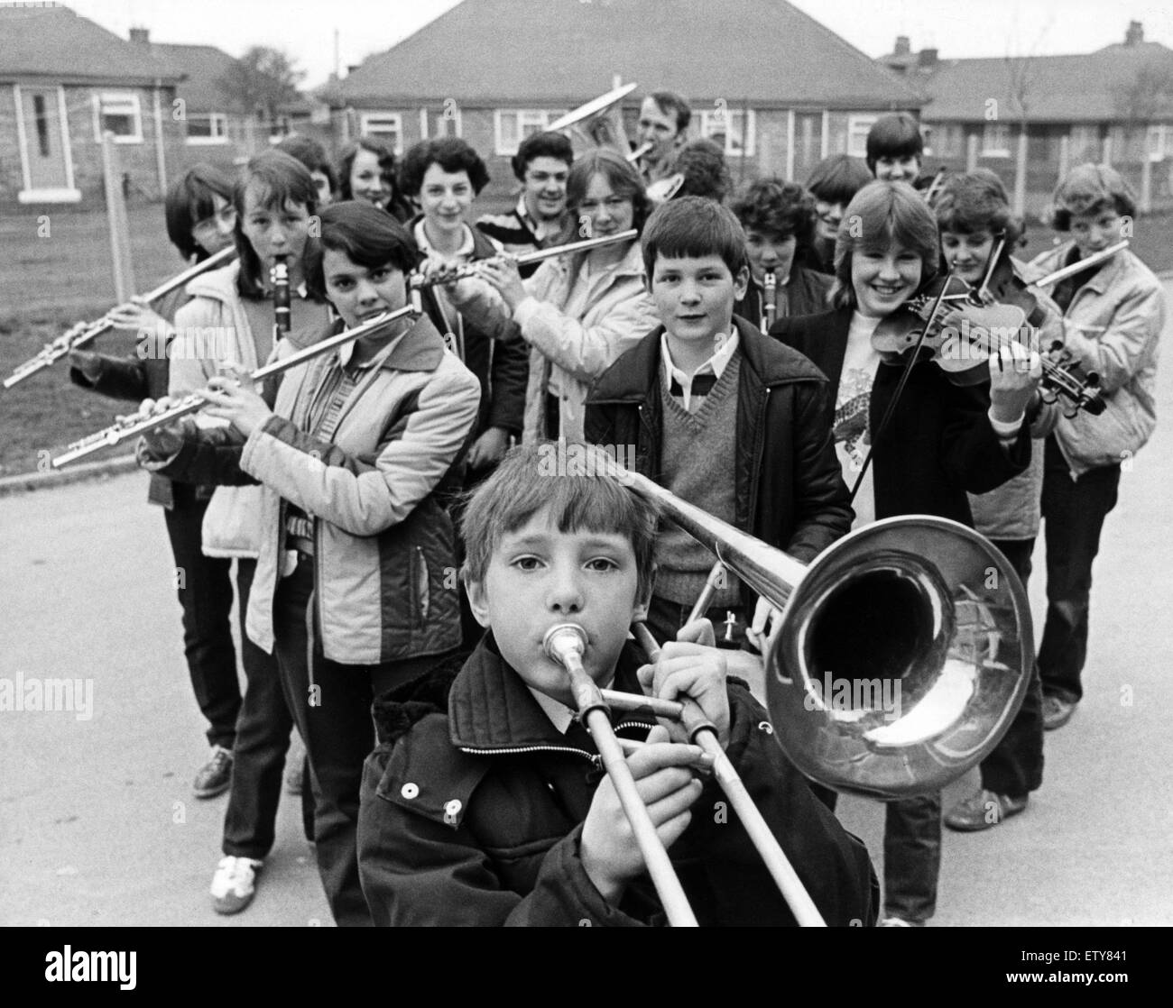 The young musicians at Sacred Heart RC Secondary School in Redcar have a good reason to blow their own trumpets. An 18-strong group , picked from the 104 who make up the school's orchestras, has just returned after a two-day intensive training course at S Stock Photo