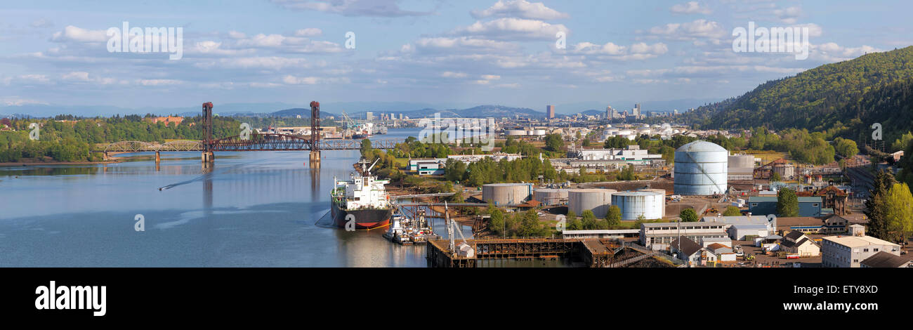 Portland Oregon Shipbuilding and Repair Shipyard Along Willamette River by St Johns Area with City and Swan Island View Panorama Stock Photo