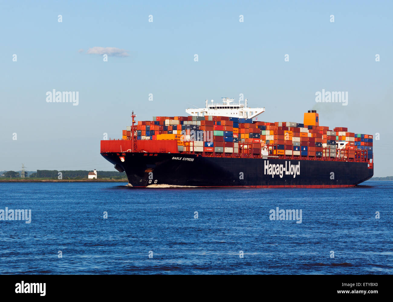 Container ship Basle Express, operated by HapagLloyd, on the Elbe