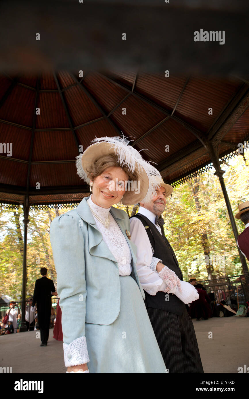 Senior couple wearing old fashioned costumes at the afternoon dance show in the Luxembourg gardens in Paris, France Stock Photo