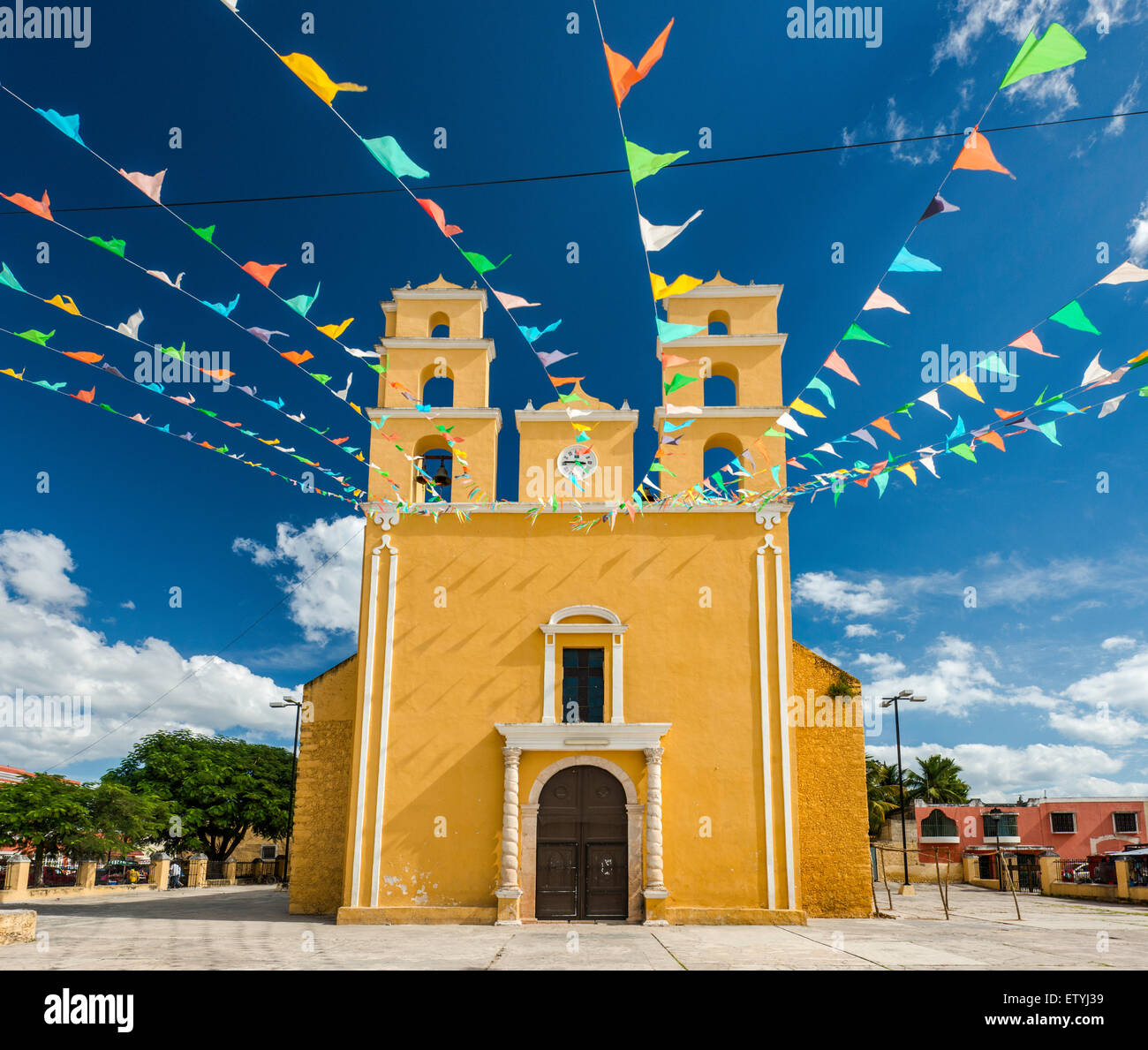 Iglesia de Nuestra Senora de la Natividad, decorated with pennants, in Acanceh, Yucatan state, Mexico Stock Photo