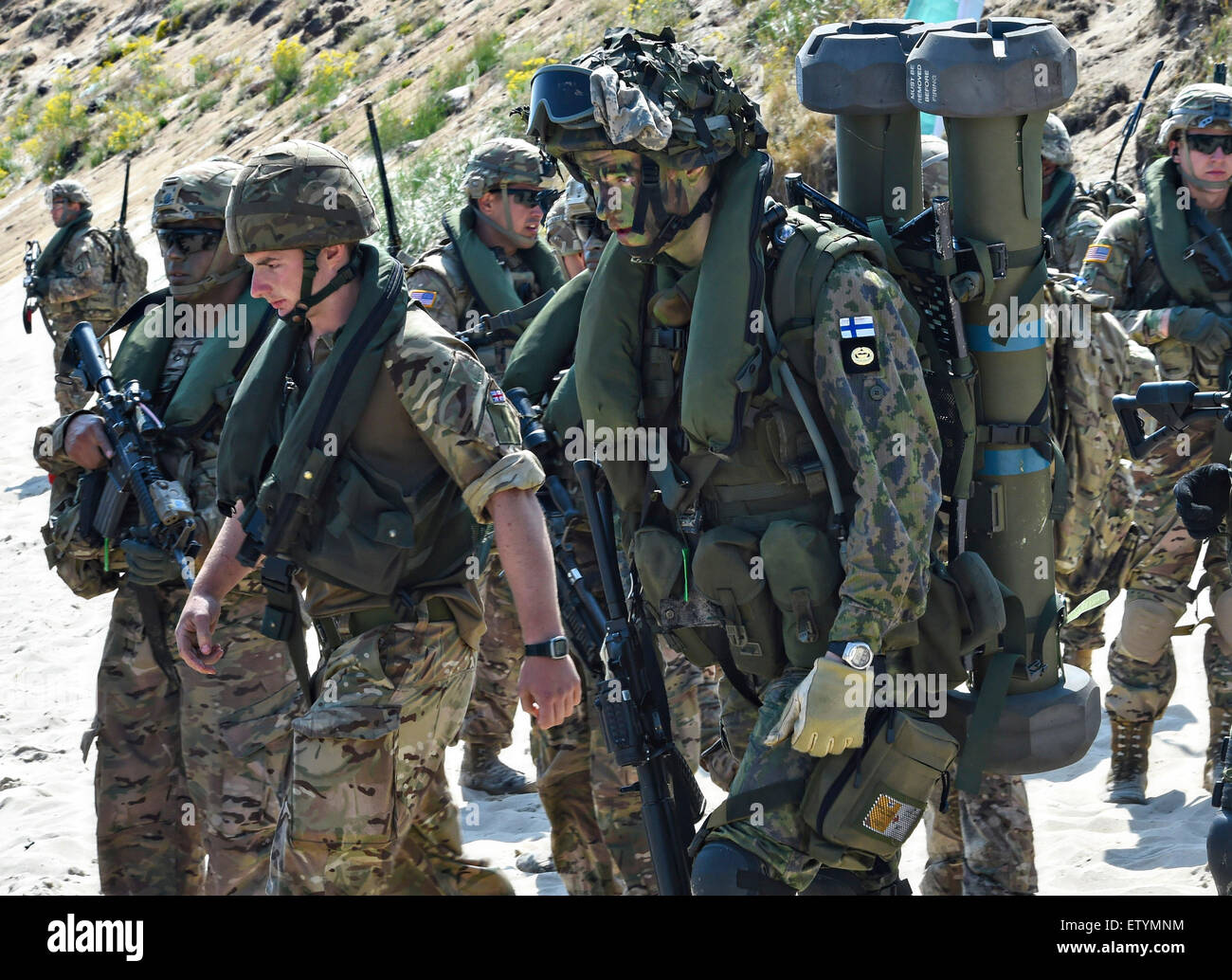 Royal British Marines and Marines from Finland during the annual NATO multinational BALTOPS exercise June 13, 2015 in Ravlunda, Sweden. Stock Photo