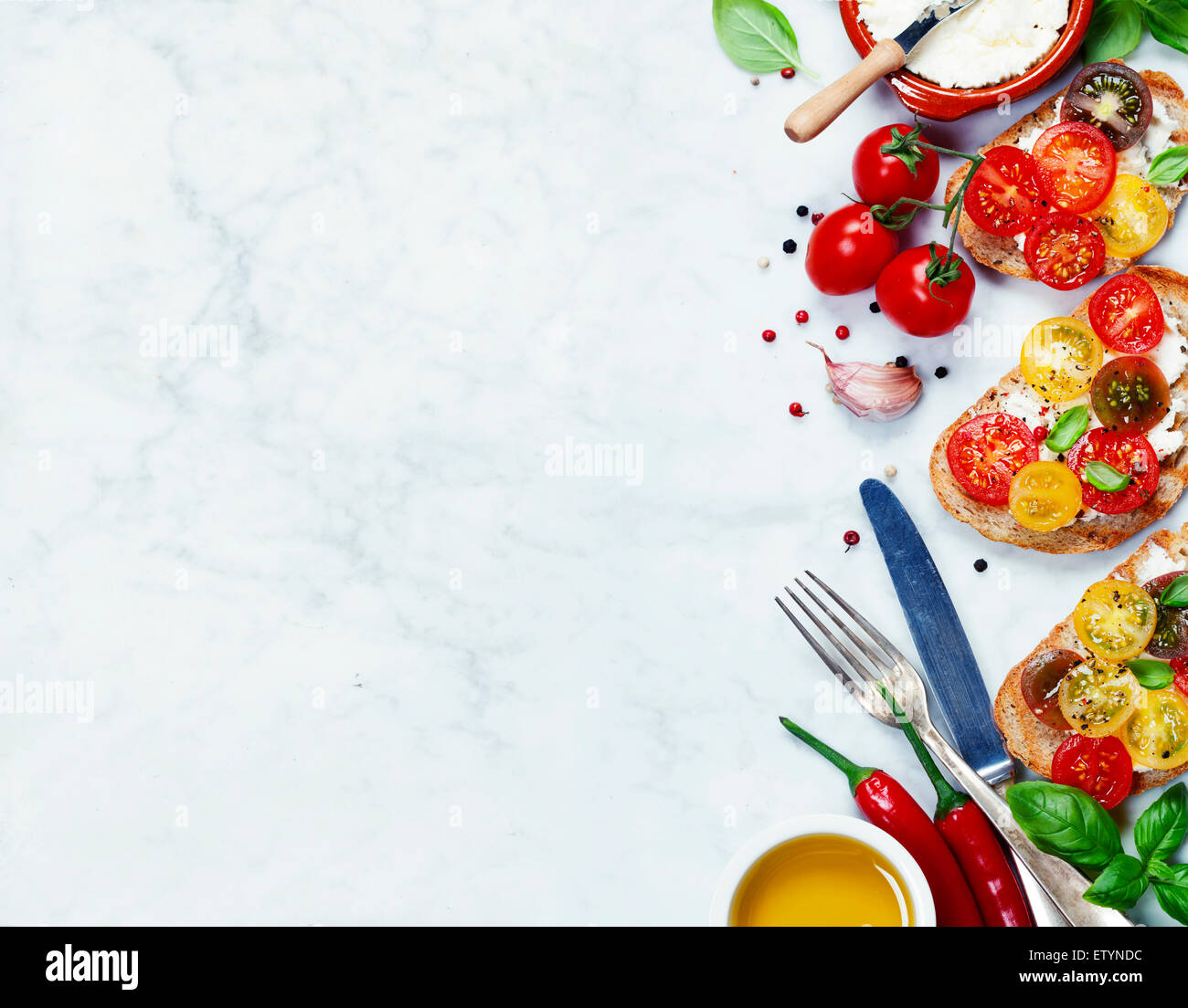 Tomato and basil sandwiches with ingredients - Italian, Vegetarian or Healthy food concept Stock Photo