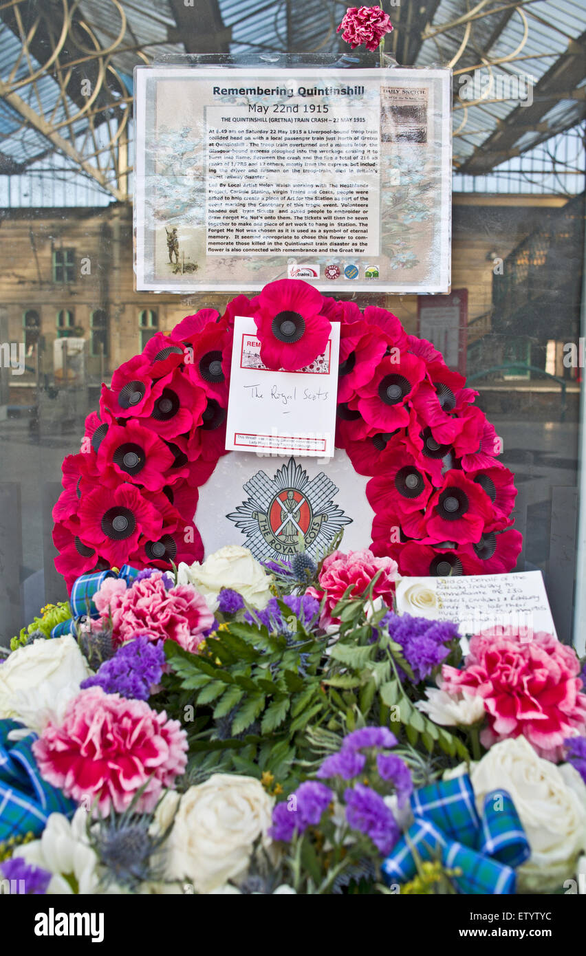 Wreath and floral arrangement commemorating Quintinshill rail disaster on display at Carlisle railway station, Cumbria UK Stock Photo