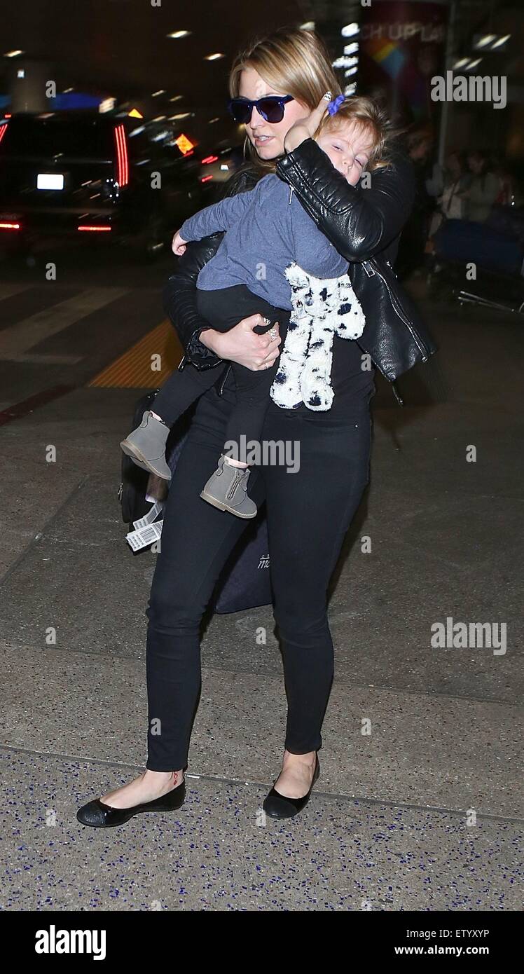 Holly Valance and her daughter arrive at Los Angeles International (LAX ...