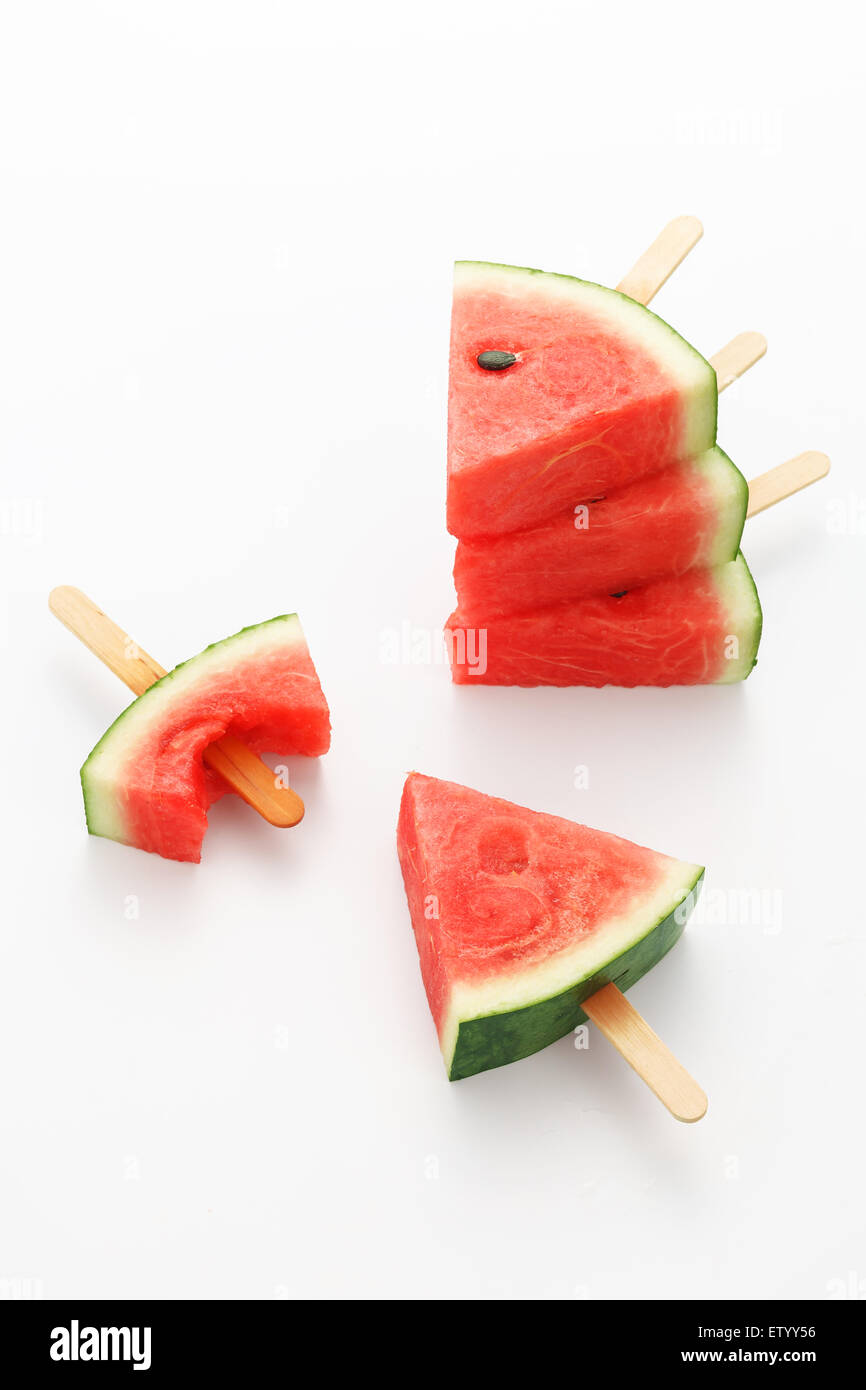 watermelon popsicle yummy fresh summer fruit sweet dessert white background Stock Photo