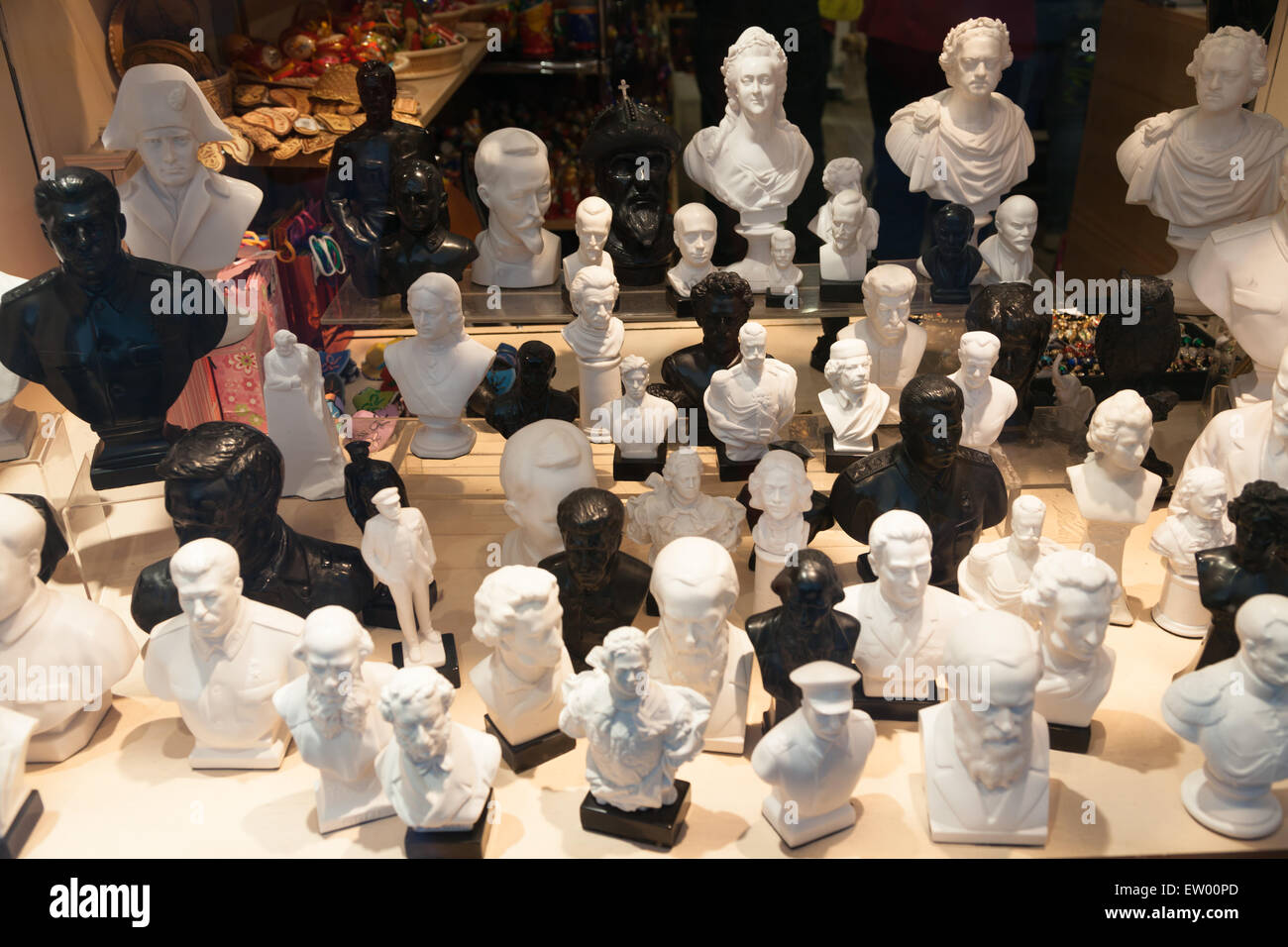 Busts of various famous historical figures in a shop window Stock Photo