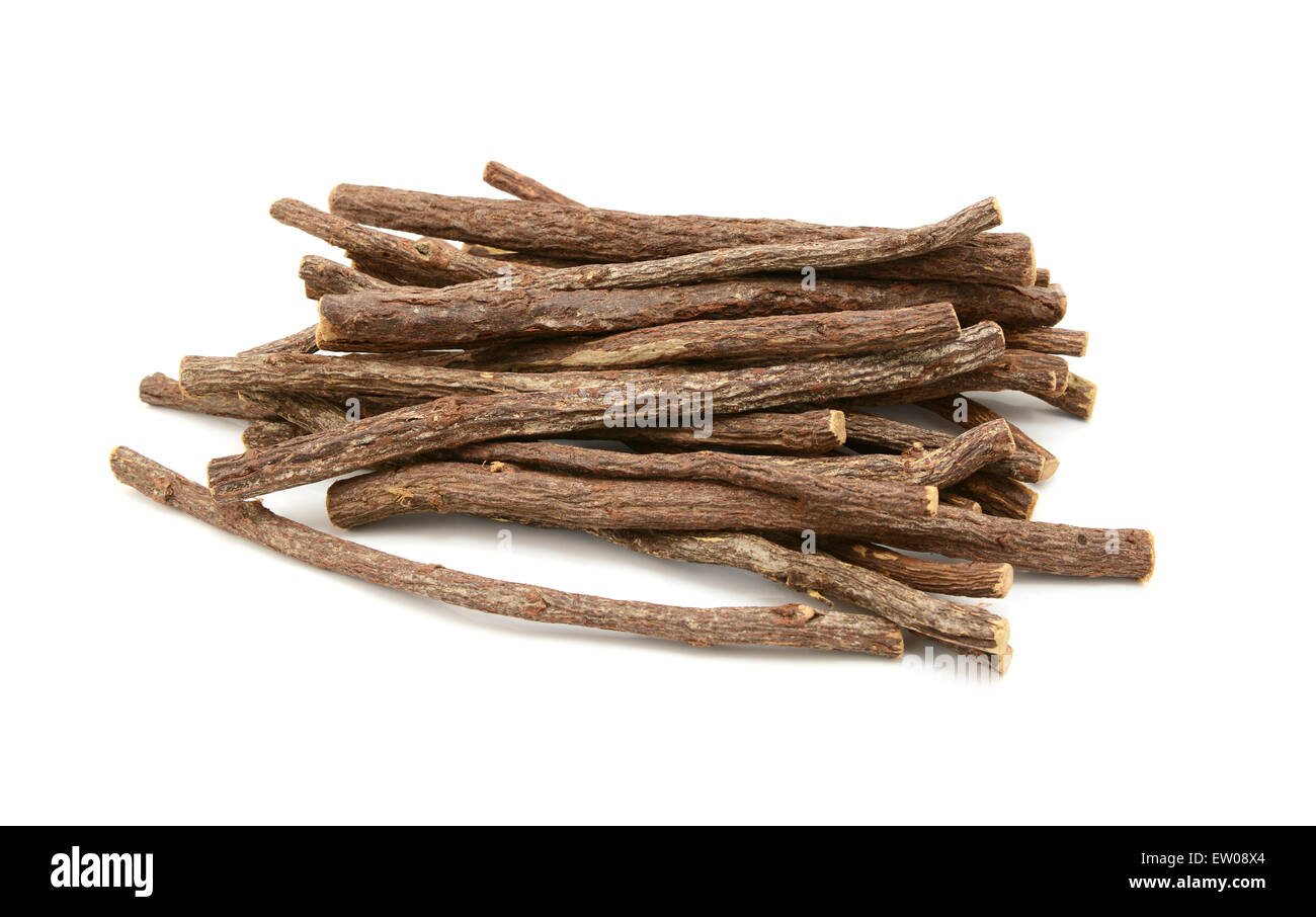 Large pile of liquorice root sticks, isolated on a white background Stock Photo Alamy