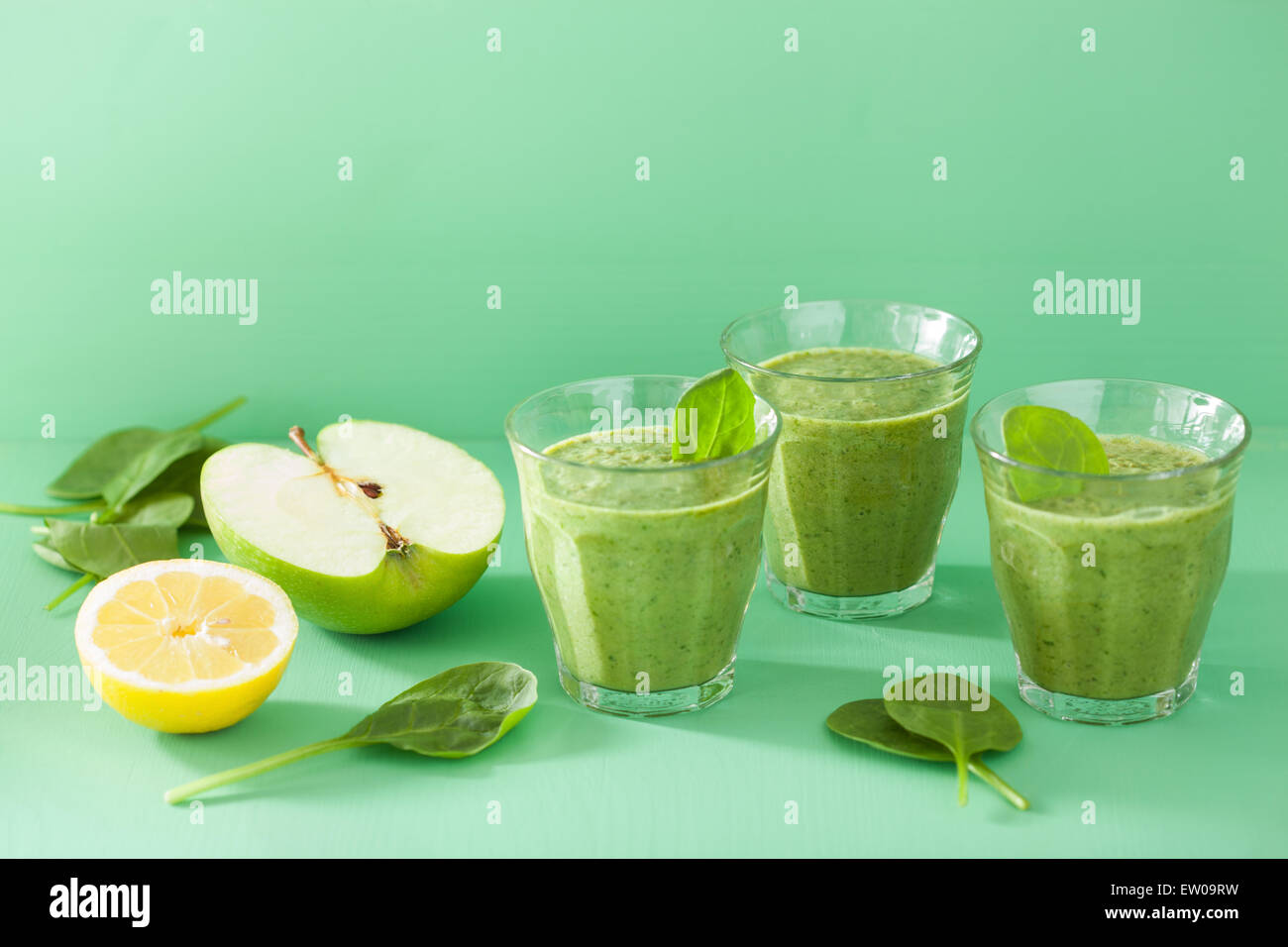 healthy green smoothie with spinach leaves apple lemon Stock Photo Alamy