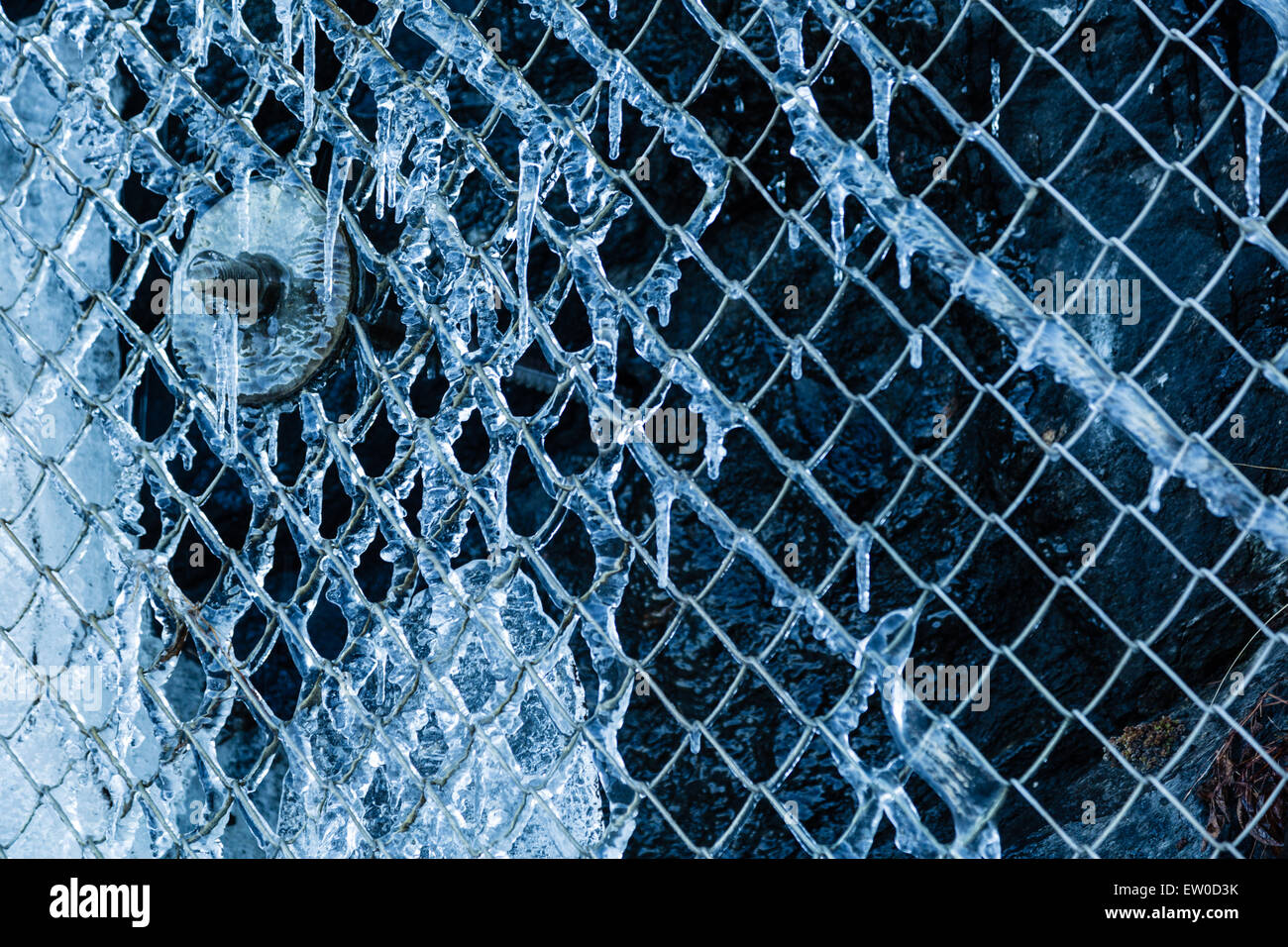 Ice on a chain link fence in Navik, Norway Stock Photo - Alamy