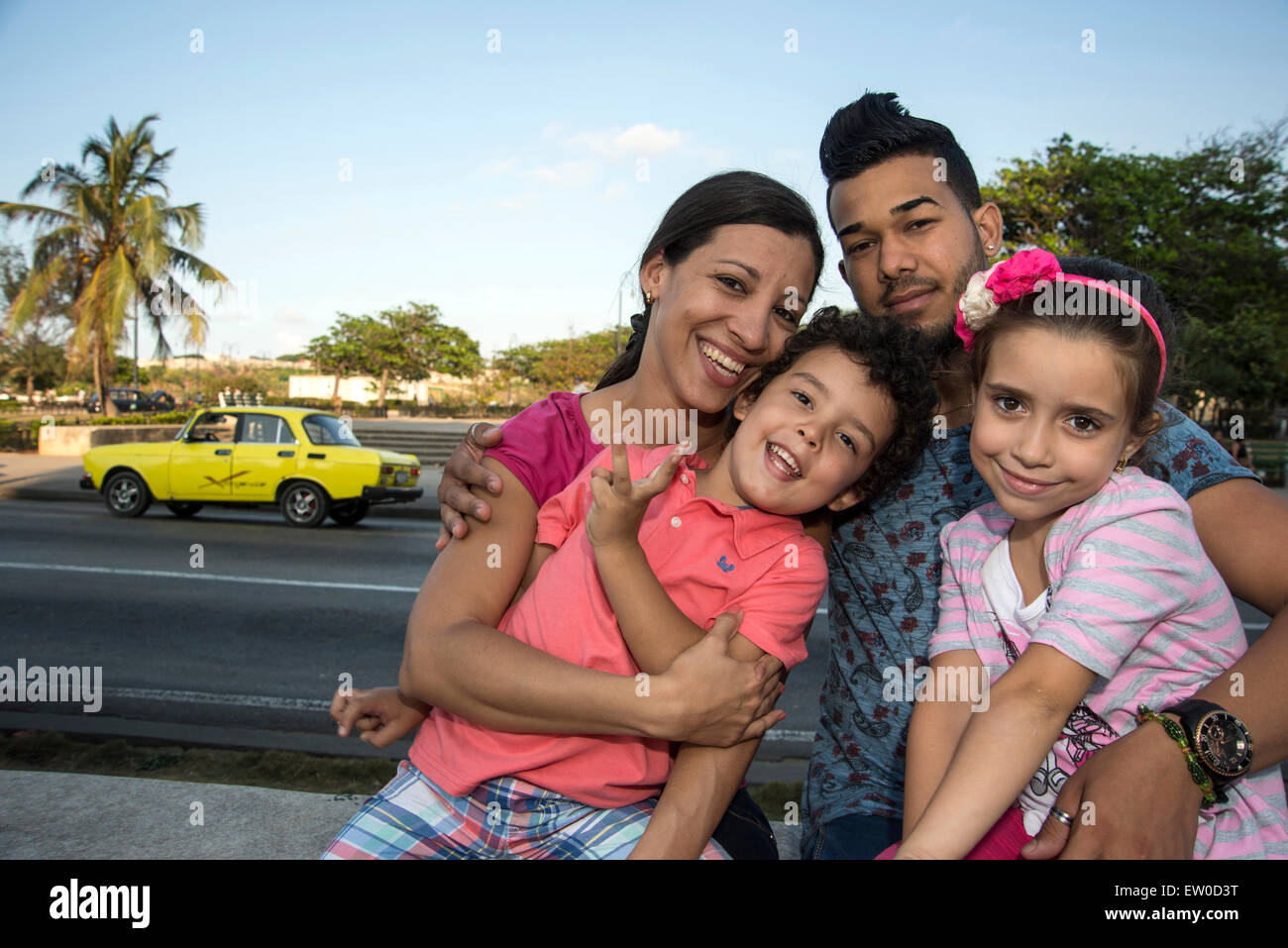 A Latin family having fun outdoors Stock Photo - Alamy