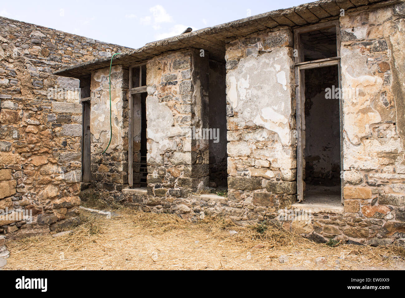 An abandoned medieval building on the Spinalonga Island in Crete. Stock Photo