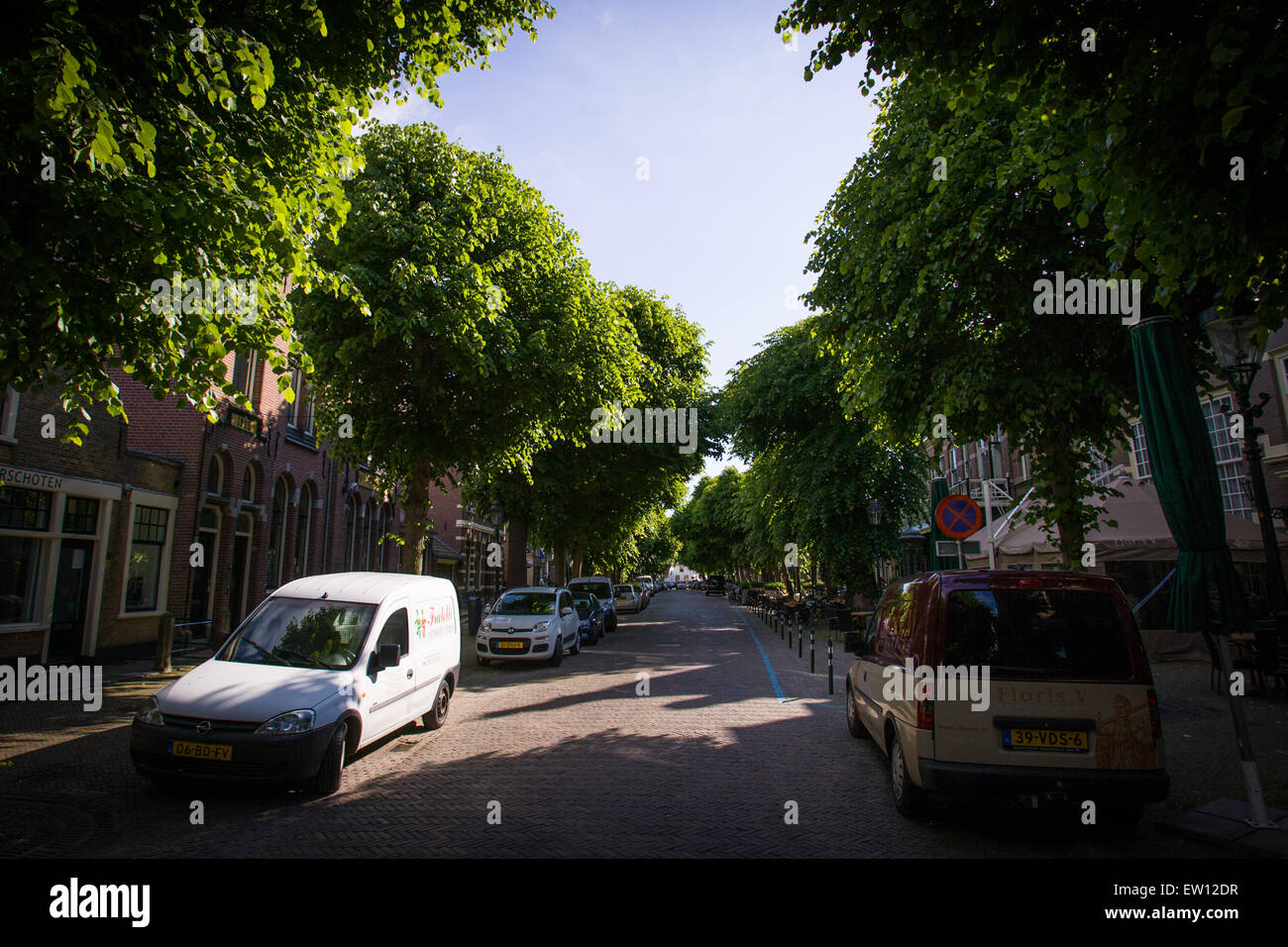 A street is seen in the old town center in a Dutch village. Stock Photo