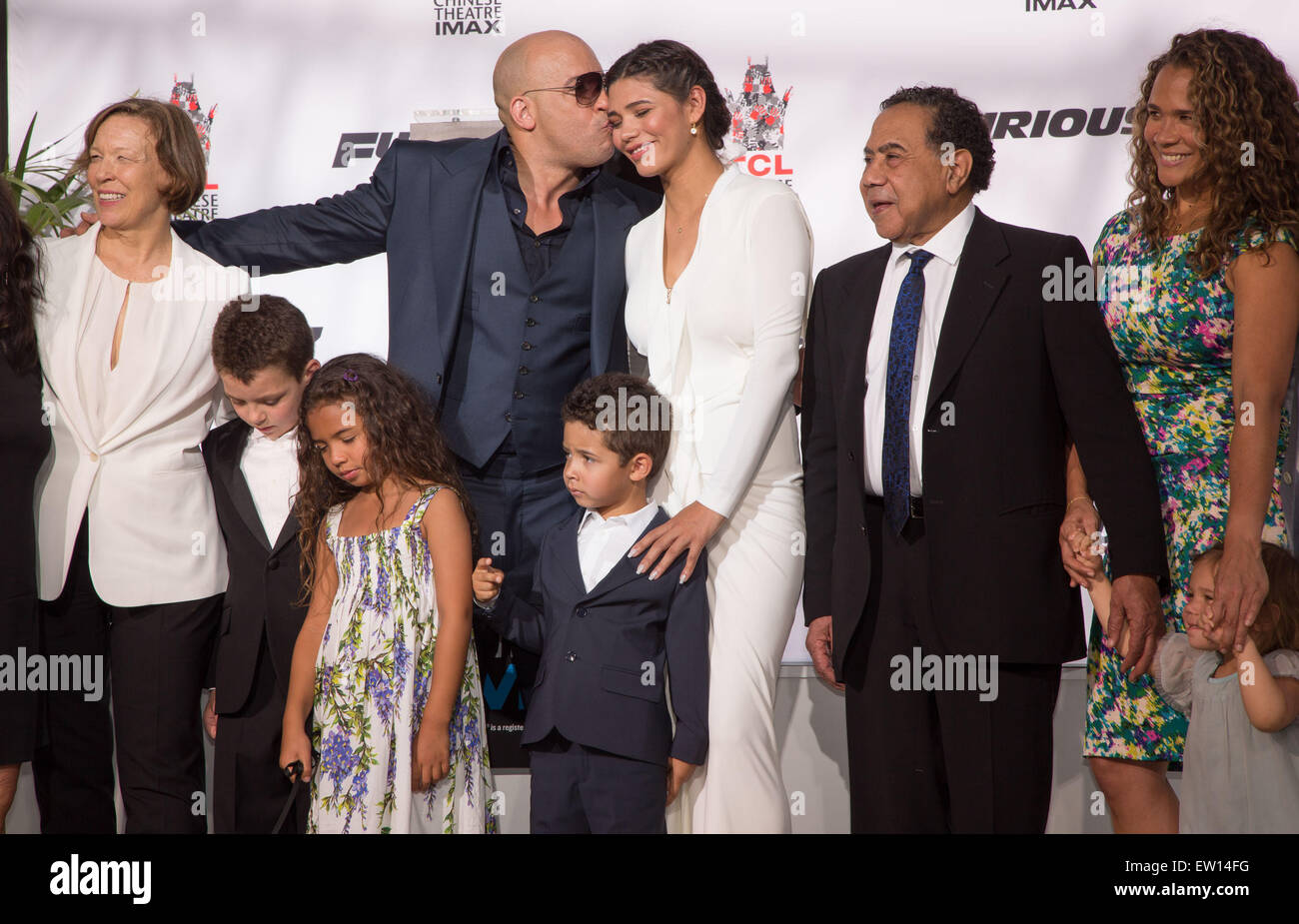 Vin Diesel's hand-print and foot-print ceremony at the TCL Chinese Theatre  Featuring: Delora Vincent, Vin Diesel, guest, Hania Riley Sinclair, Vincent Sinclair, Paloma Jiménez, Irving Vincent, family Where: Los Angeles, California, United States When: 01 Apr 2015 C Stock Photo