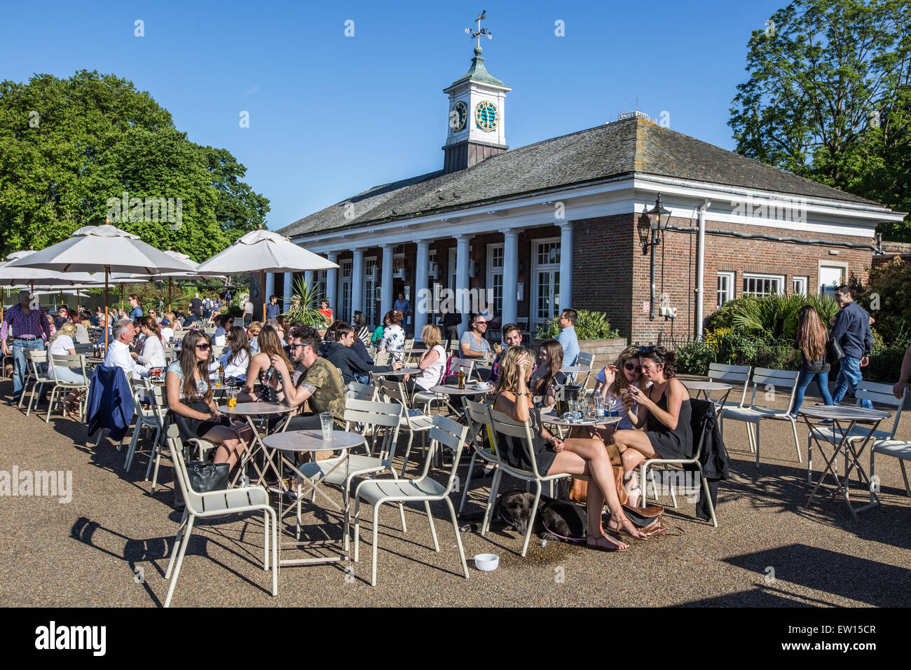People Sitting in The Lido Cafe Hyde Park London UK Stock Photo