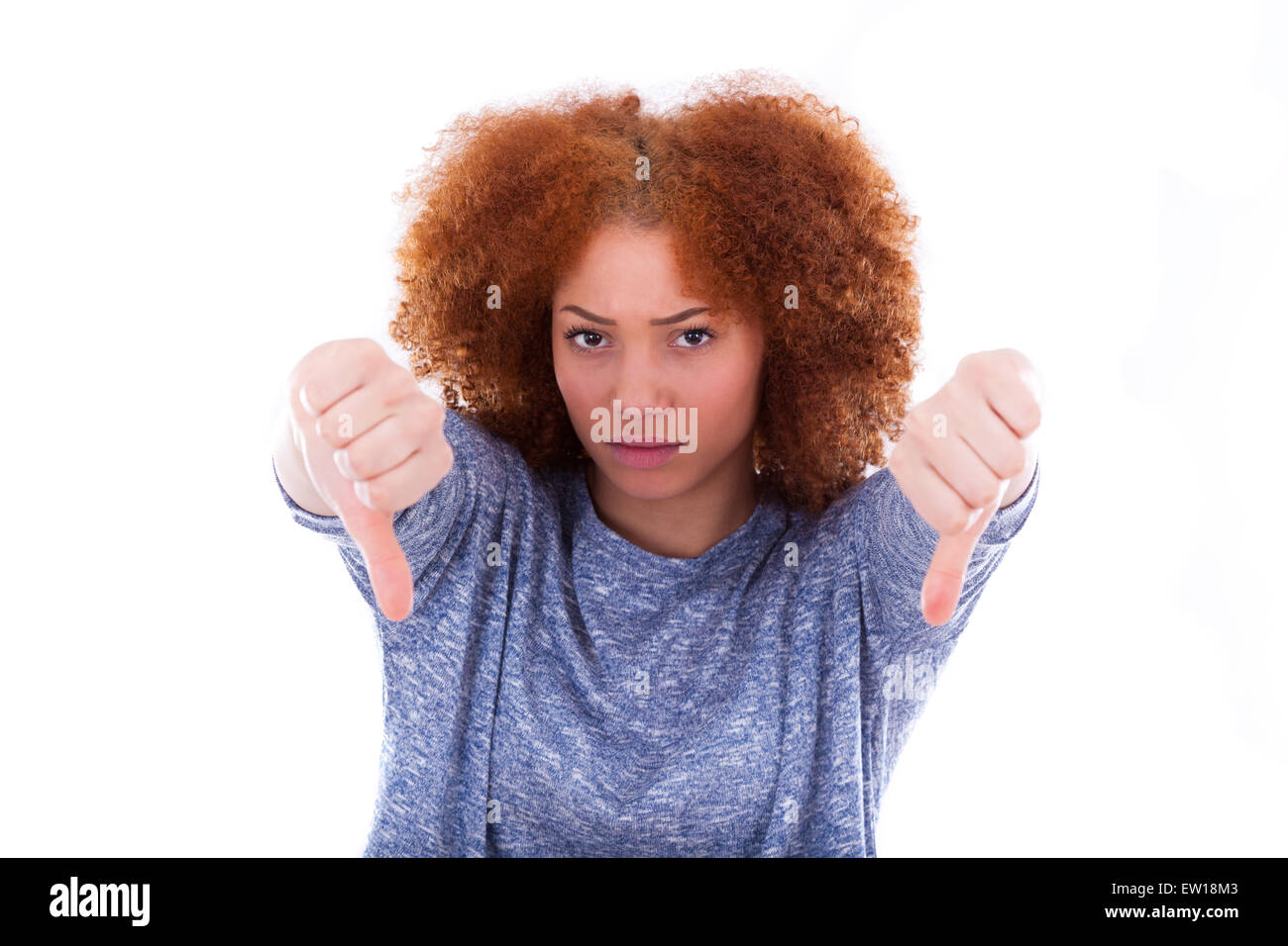 Young african american girl making thumbs down gesture isolated on ...