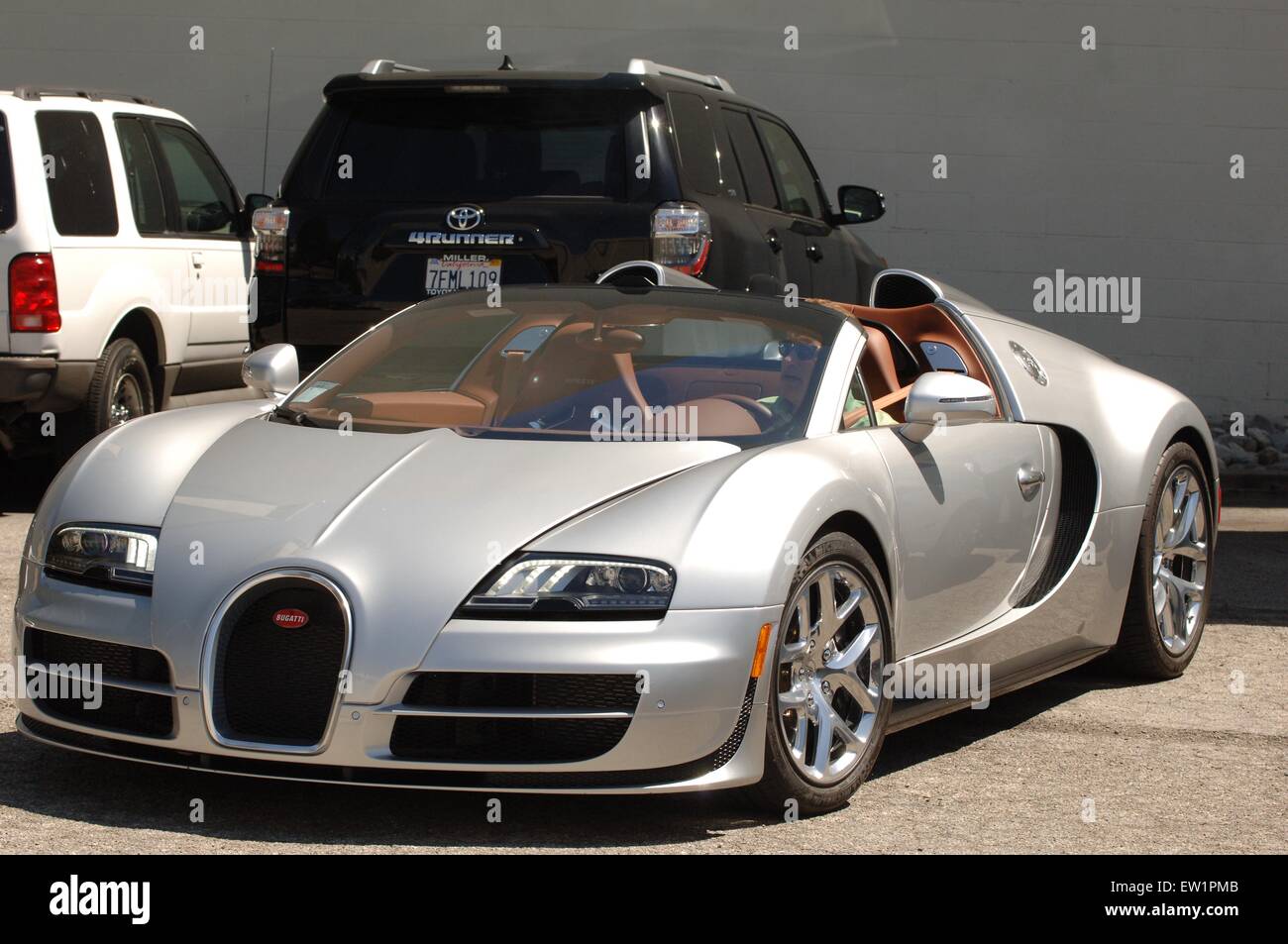 Arnold Schwarzenegger spotted out and about in Beverly Hills in a Bugatti Veyron  Featuring: Arnold Schwarzenegger Where: Los Angeles, California, United States When: 04 Apr 2015 C Stock Photo