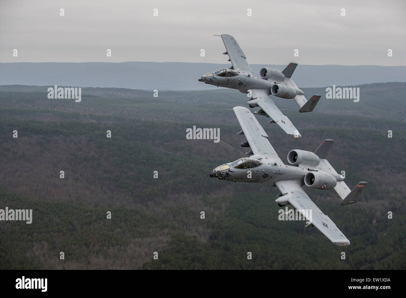 December 30, 2013 - A-10 Thunderbolt II's conduct a training mission over Razorback Range, Fort Chaffee Maneuver Training Center Stock Photo