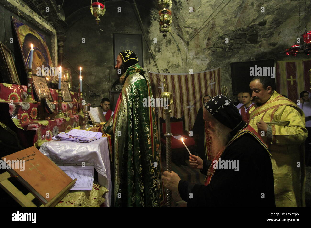 Israel, Jerusalem Old City, Syrian Orthodox Archbishop Mar Malki Murad at the Chapel of St. Joseph of Arimathea and St. Nicodemus in the Church of the Holy Sepulchre Stock Photo