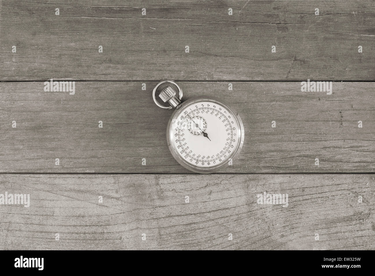 An old and vintage stopwatch over a wooden surface Stock Photo - Alamy