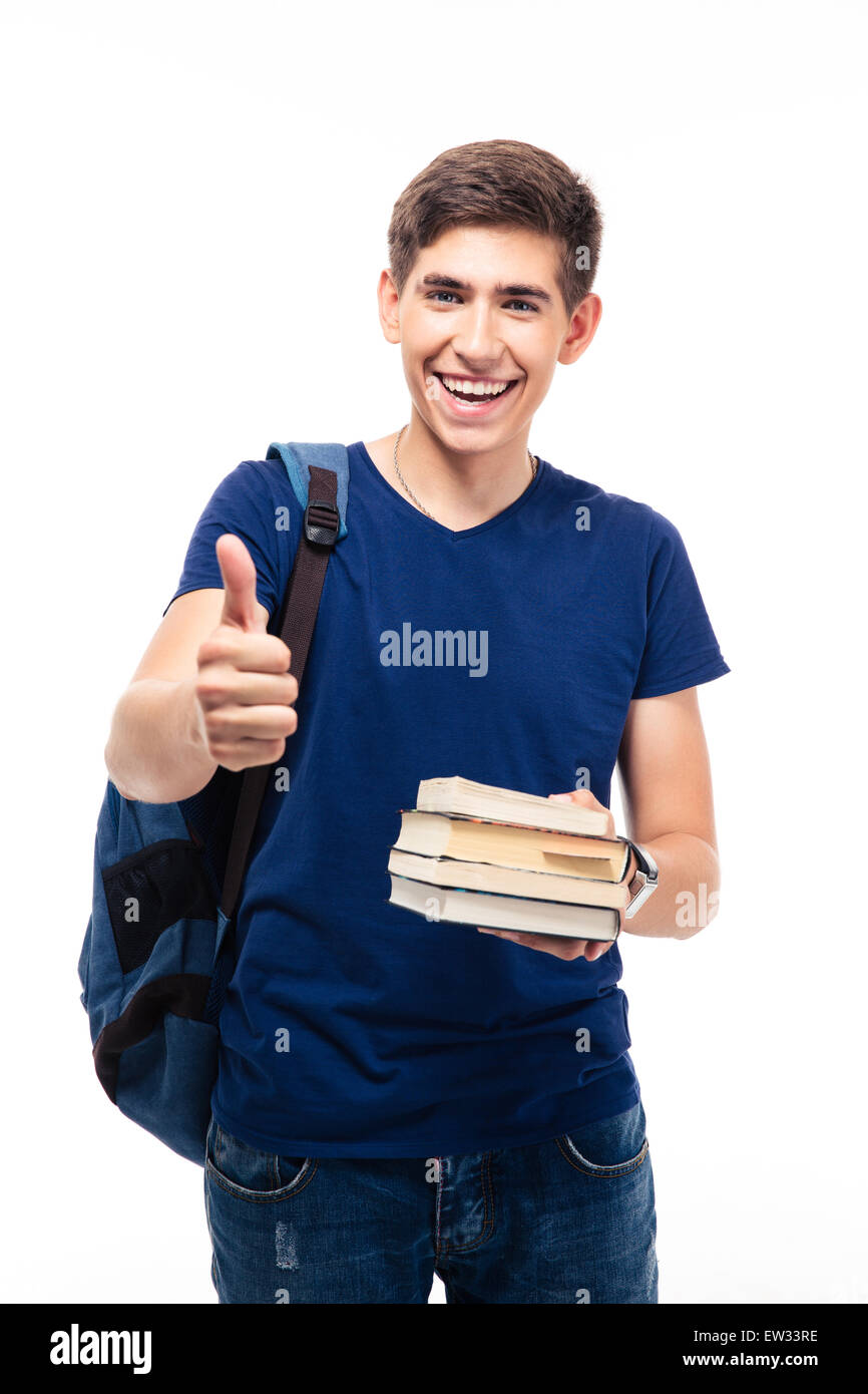 Happy male student holding book and showing thumb up isolated on a ...